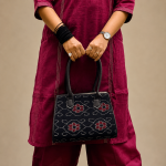 Handmade Odisha Black Ikat handbag crafted with authentic Sambalpuri Ikat cotton fabric.