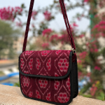 Handcrafted Odisha Ikat Maroon Sling Bag made with authentic Sambalpuri Ikat handloom fabric.