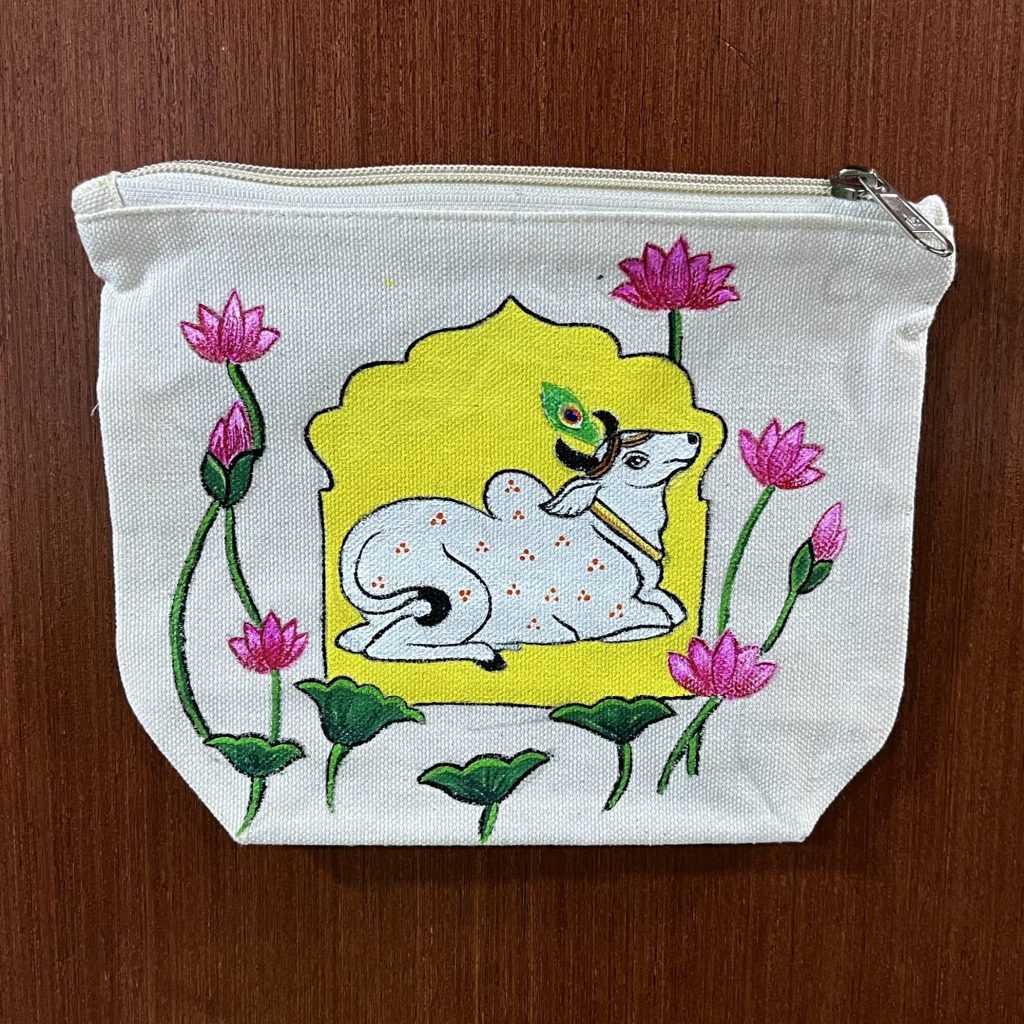 Hand-Painted Pichwai Bull & Lotus Canvas Pouch featuring a traditional bull and lotus on natural cotton canvas.