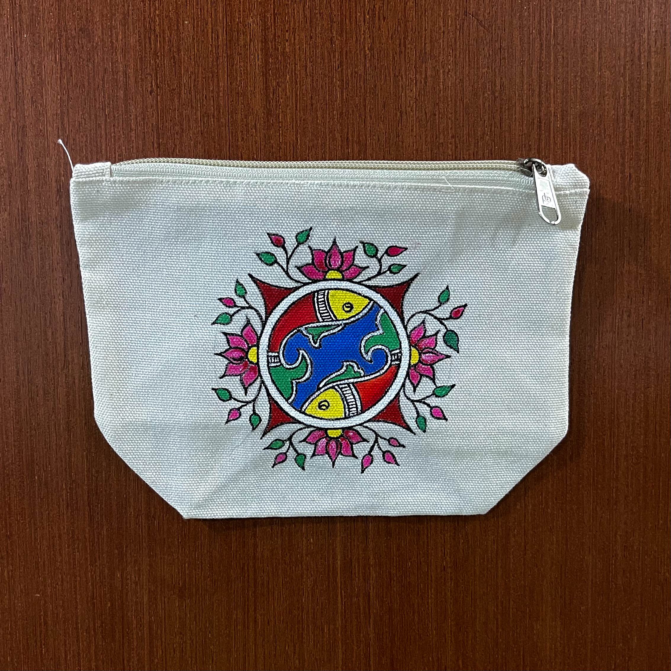 Hand-painted mandala canvas pouch featuring a fish and lotus design on premium cotton canvas.