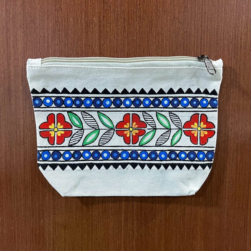 Hand-painted Madhubani canvas zipper pouch with floral border on natural cotton canvas.