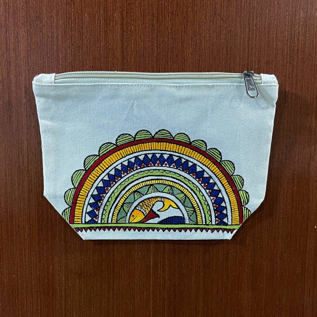 Hand-painted cotton canvas zipper pouch featuring a mandala-inspired fish motif with colourful concentric decorative patterns.