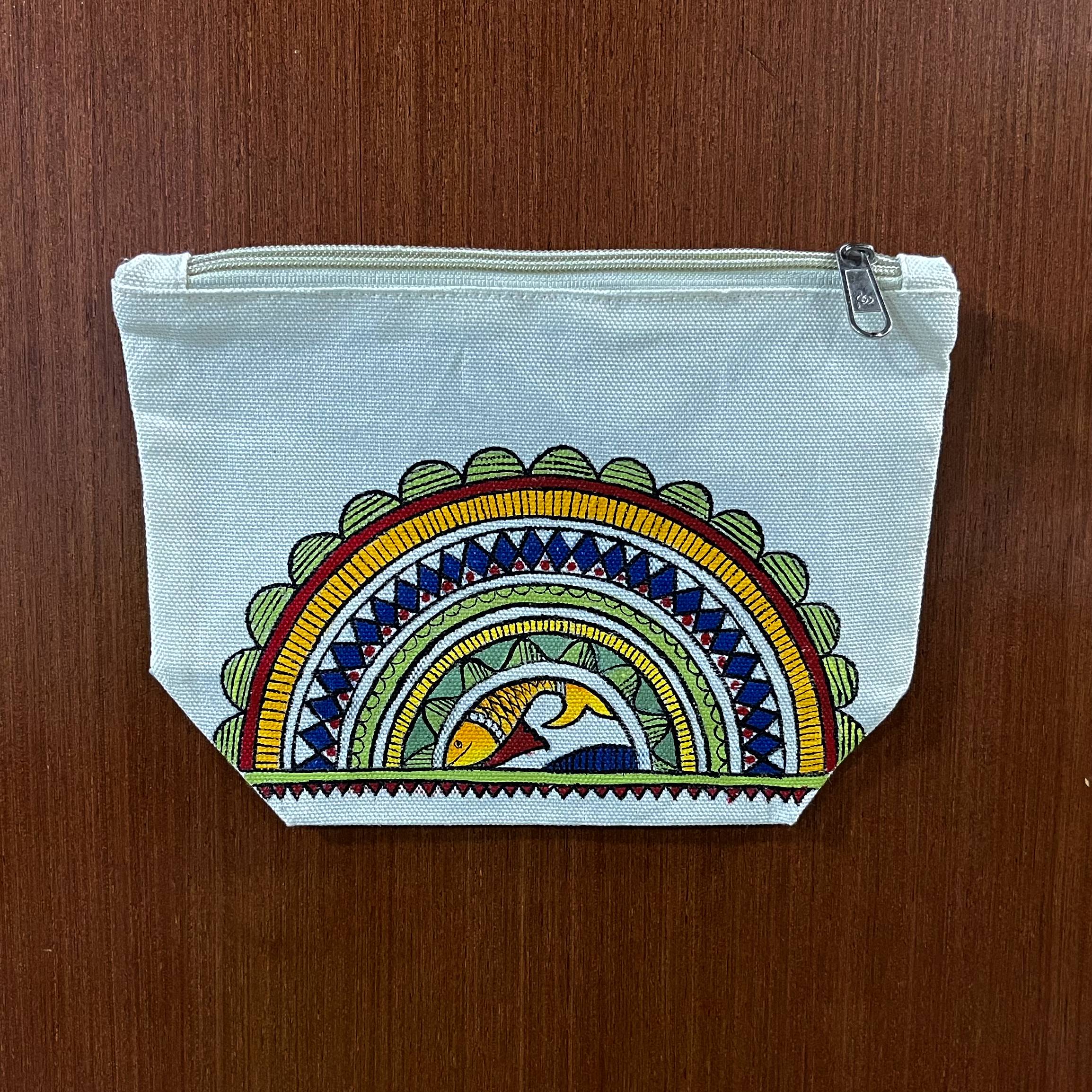 Hand-painted cotton canvas zipper pouch featuring a mandala-inspired fish motif with colourful concentric decorative patterns.