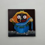 Hand-painted canvas painting of Lord Jagannath featuring vibrant floral decorations and expressive traditional artwork.