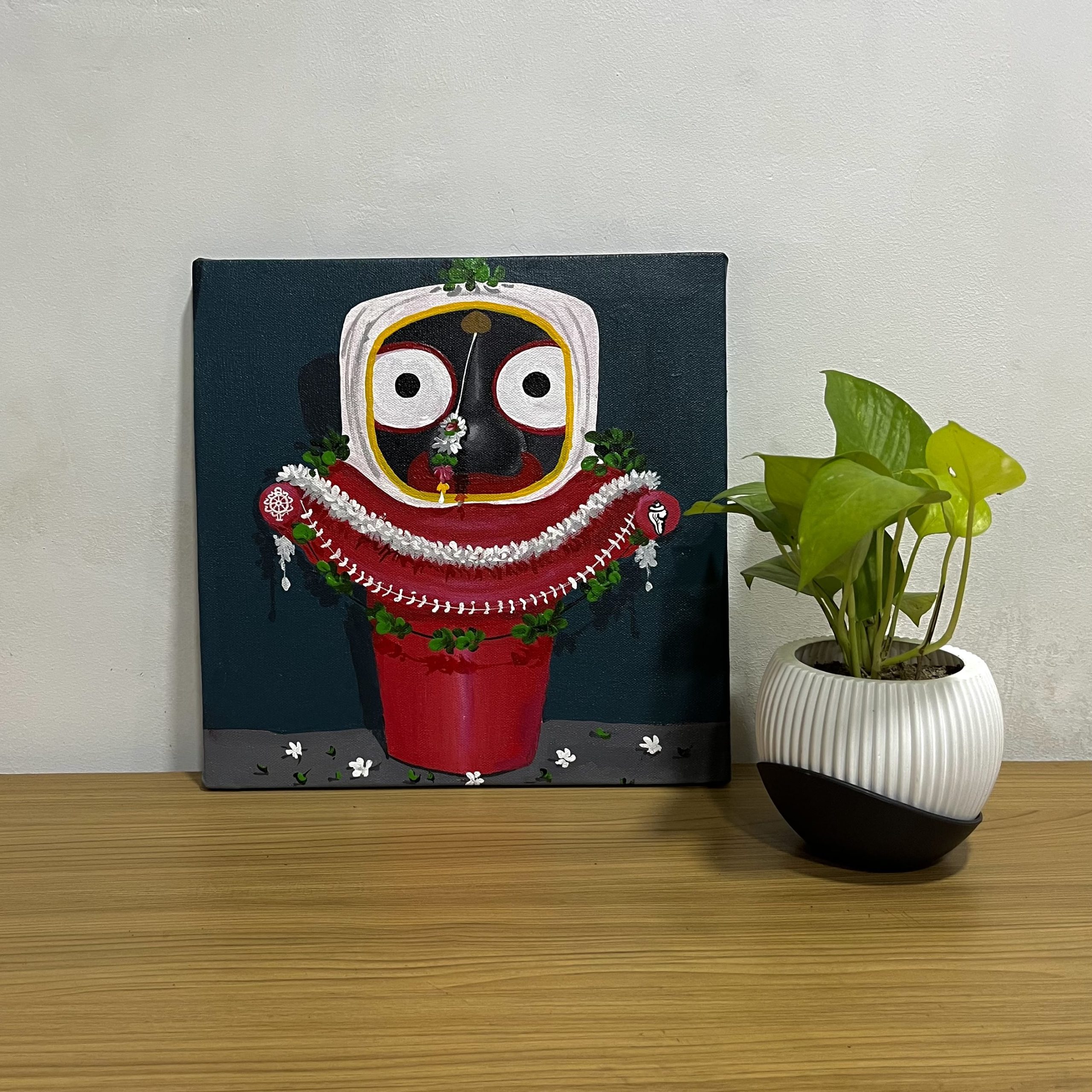 Hand-painted canvas painting of Lord Jagannath featuring vibrant floral decorations and expressive traditional artwork.